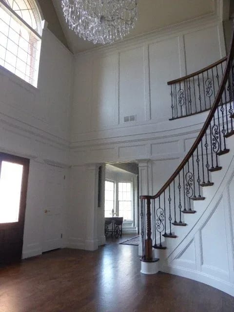 Curved Staircase Wainscoting & Molding Curved staircase wainscoting and custom wall molding installation