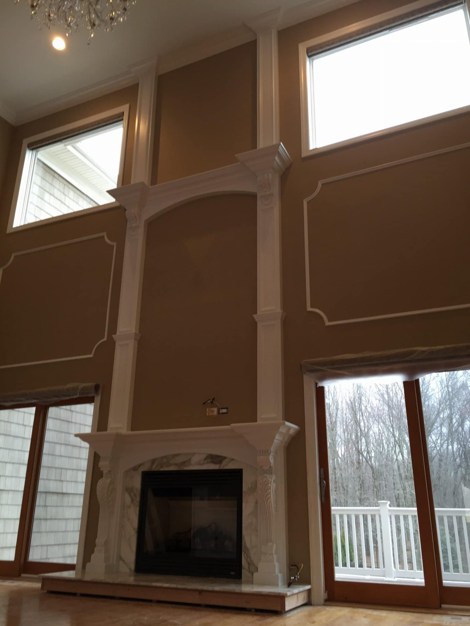 Custom fireplace surround installation in a New Jersey living room